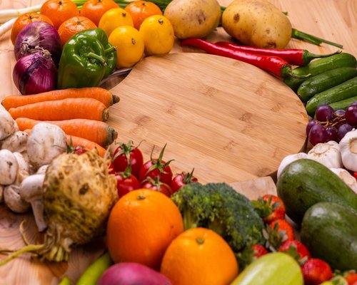 Fresh fruits and vegetables on a wooden table